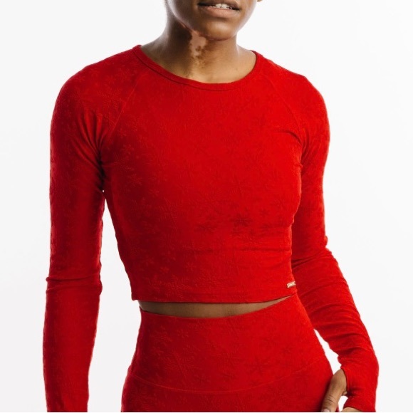 ZYIA Tops - NWT and bag Zyia Red snowflake crop long sleeve T size M